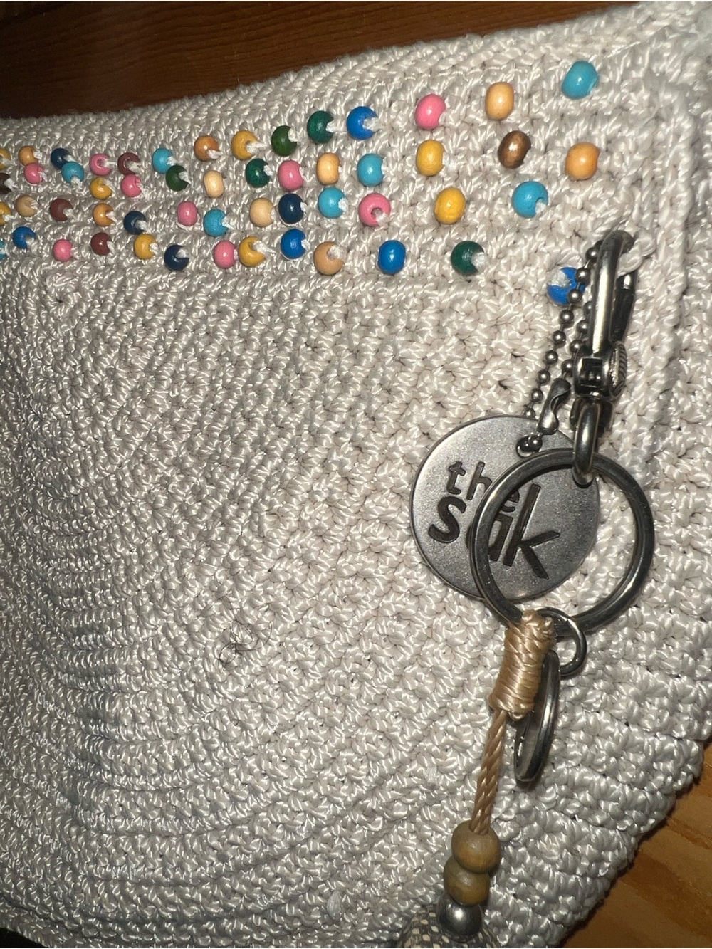 The Sak Cream Crochet Crossbody bag with Multicolor Bead Trim